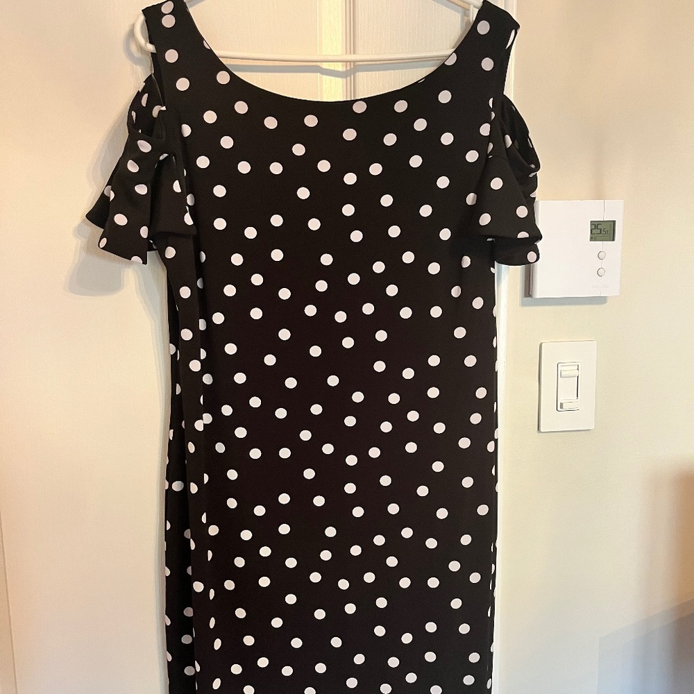 Polka dot dress . With fun sleeves